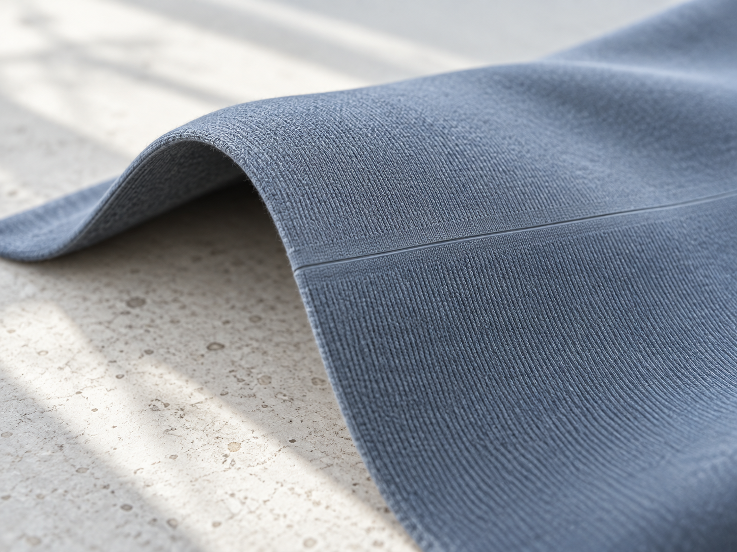 Fine bonded join in blue-grey fabric